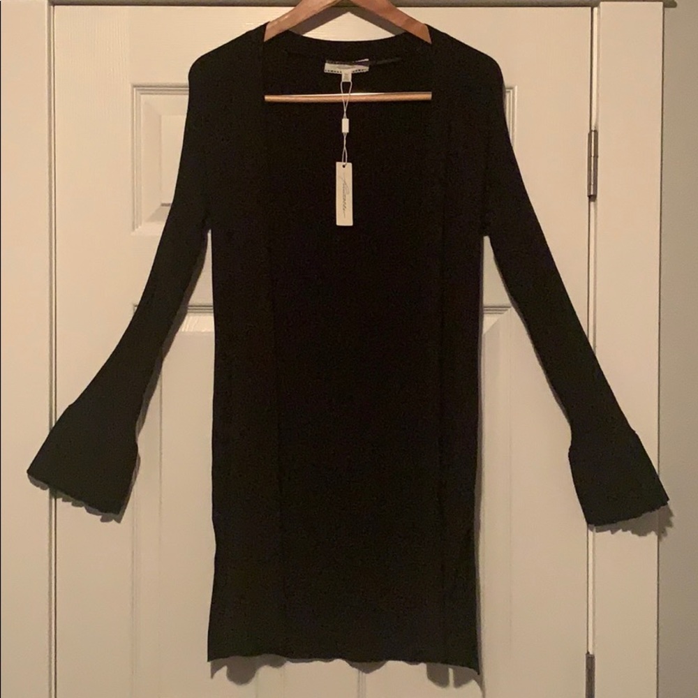 Classic Duster Sweater w/ stylish ruffle sleeves.